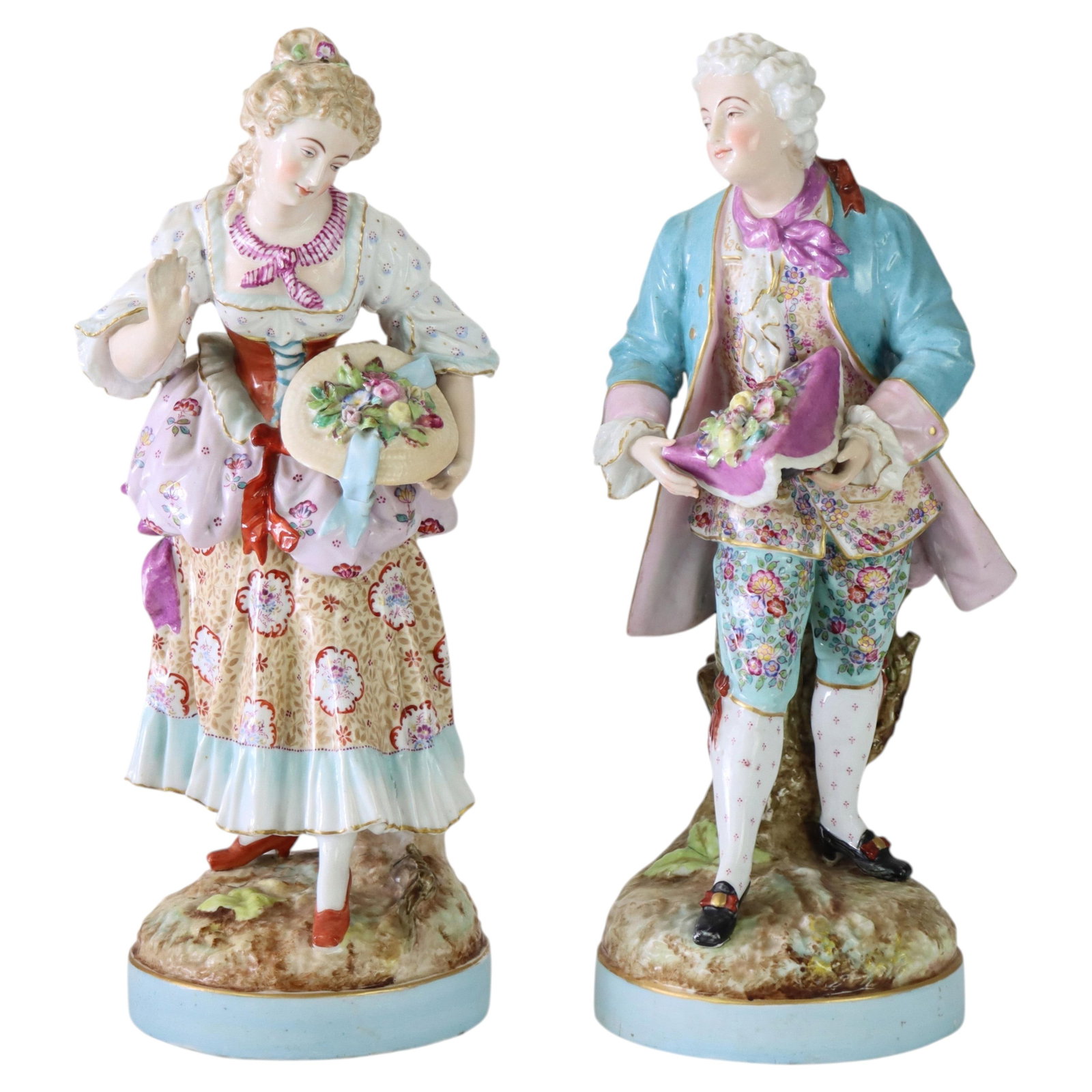 Set of Two Meissen Style Porcelain Gardener Figures Circa 1890: Set of Two Meissen Style Porcelain Gardener Figures Circa 1890 This pair of antique porcelain figures, crafted in the style of Meissen and dating to circa 1890, features a man and woman depicted as ga