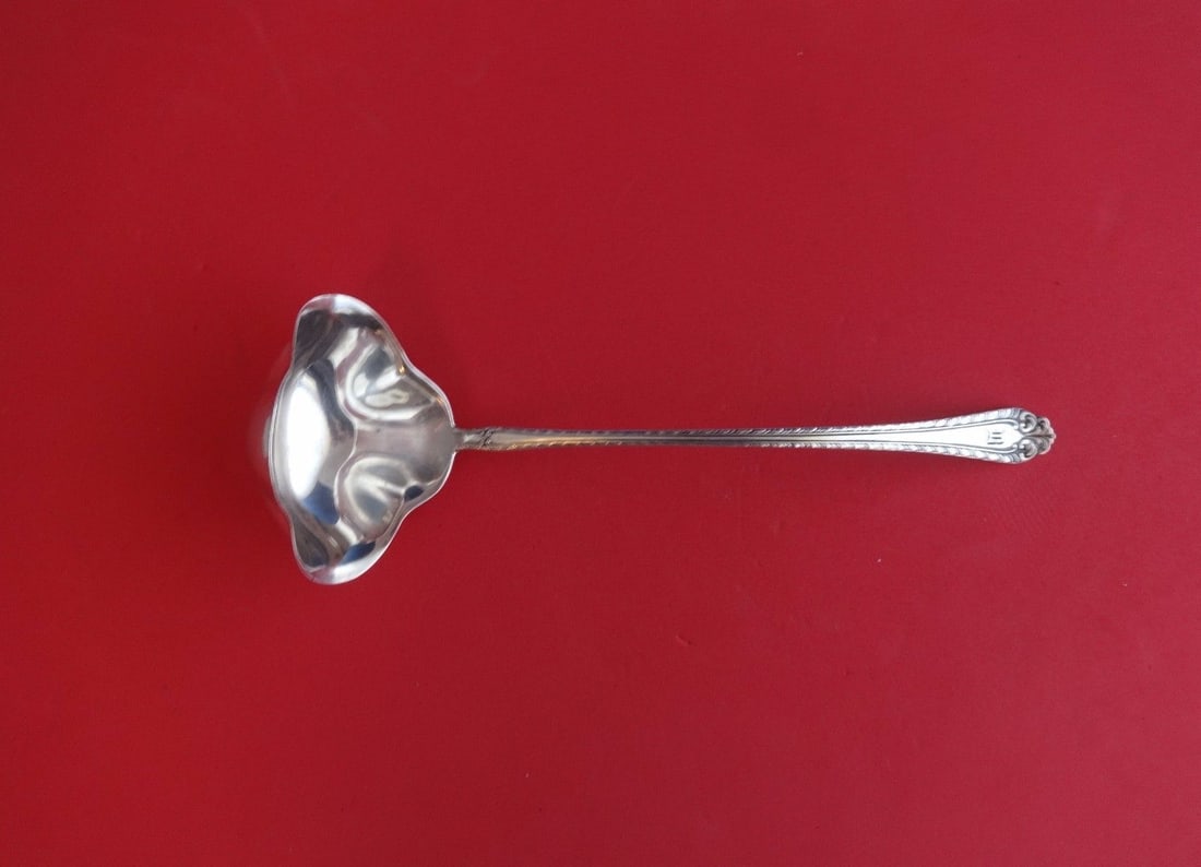 Alvin Melrose Sterling Silver Bouillon Ladle 8 3 4 Inches: Alvin Melrose Sterling Silver Bouillon Ladle 8 3 4 Inches This is a sterling silver bouillon ladle with spouts in the Melrose pattern by Alvin. The ladle features a decorative handle and a flared bowl