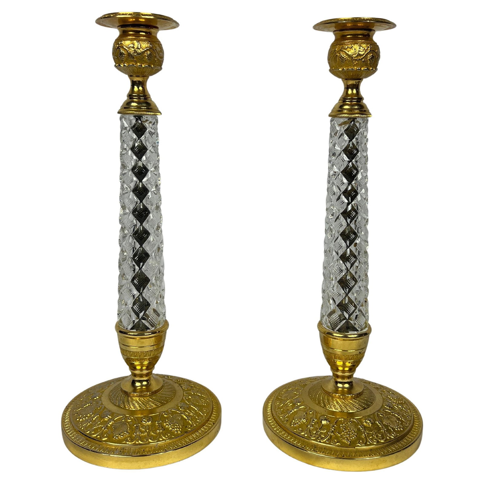 19th Century Charles X Gilt Bronze Crystal Candlesticks Set of 2: 19th Century Charles X Gilt Bronze Crystal Candlesticks Set of 2 This exquisite pair of 19th-century Charles X candlesticks embodies the refinement and opulence of early French design. Crafted during 