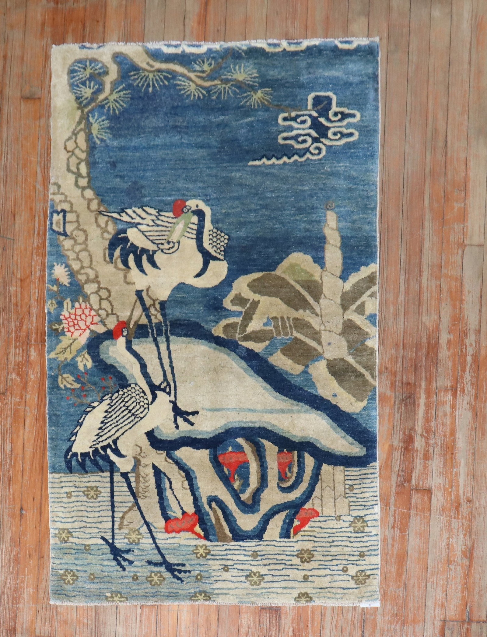 3' x 5' 1" Early 20th Century Tibetan Pictorial Rug: 3' x 5' 1" Early 20th Century Tibetan Pictorial Rug Early 20th century Tibetan pictorial rug in a light blue colorway. This pre-owned small-format rug features a pictorial design and retains the origi