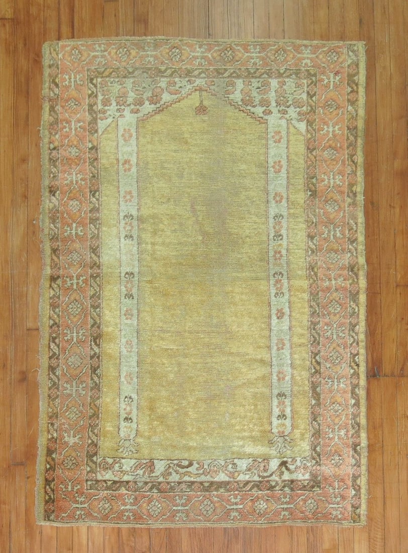 4' x 5' 9" Antique Angora Oushak Accent Rug: 4' x 5' 9" Antique Angora Oushak Accent Rug Late 19th century antique Angora Oushak accent rug featuring a column prayer niche motif on a gold yellow field. Pre-owned condition. Specifications Type: A