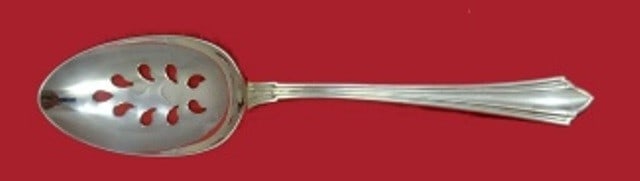 International Sterling Silver Westminster Slotted Serving Spoon 9-Hole Custom 8.5": International Sterling Silver Westminster Slotted Serving Spoon 9-Hole Custom 8.5" Elevate your dining experience with the Westminster by International Sterling Silver Slotted Spoon. Crafted from high