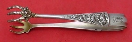 Shiebler Chrysanthemum Sterling Silver Sugar Tong 5 3/8 inches: Shiebler Chrysanthemum Sterling Silver Sugar Tong 5 3/8 inches This exquisite sugar tong is crafted from high-quality sterling silver and features the elegant Chrysanthemum pattern by Shiebler. Measur