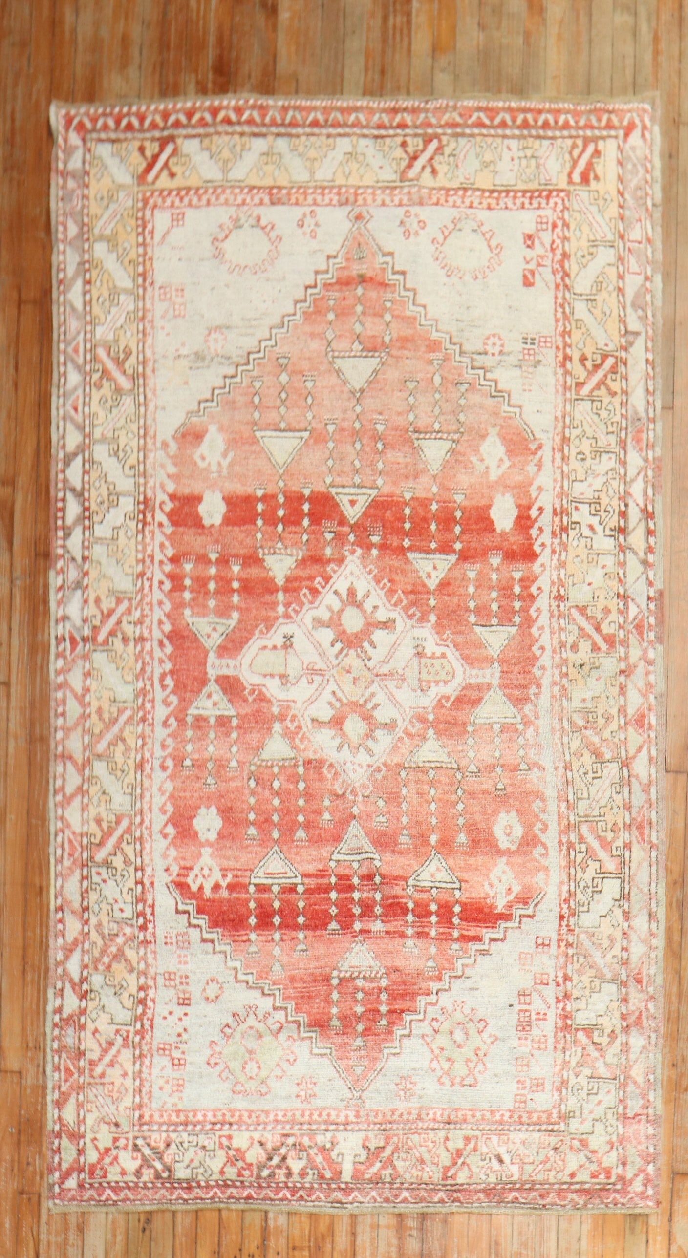 5' 2" x 9' 2" Turkish Daizkare Anatolian Area Rug: 5' 2" x 9' 2" Turkish Daizkare Anatolian Area Rug Mid 20th century Turkish Anatolian Daizkare rug with a geometric pattern and a soft red palette accented by cream and beige tones. This pre-owned area