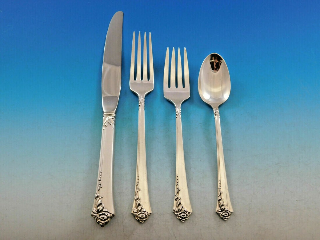 Oneida Damask Rose Sterling Silver 4-Piece Place Setting: Oneida Damask Rose Sterling Silver 4-Piece Place Setting Enhance your dining experience with this exquisite Damask Rose place setting by Oneida. Crafted from high-quality sterling silver, this 4-piece
