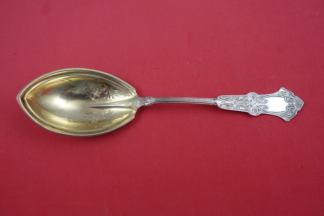 Whiting Alhambra Sterling Silver Preserve Spoon Gold Washed 7.5 Inch: Whiting Alhambra Sterling Silver Preserve Spoon Gold Washed 7.5 Inch Discover the exquisite Alhambra Preserve Spoon by Whiting, crafted from fine sterling silver and beautifully enhanced with a bright
