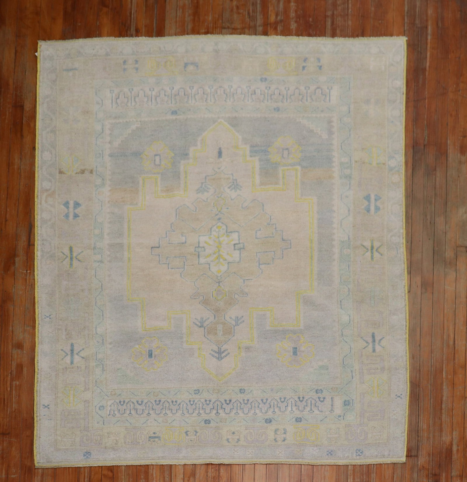 6' 1" x 7' 2" Square Turkish Oushak Rug Mid 20th Century: 6' 1" x 7' 2" Square Turkish Oushak Rug Mid 20th Century Vintage Turkish Oushak rug in a square format from the mid-20th century. The field is gray with predominant accents in blue, light blue, and va