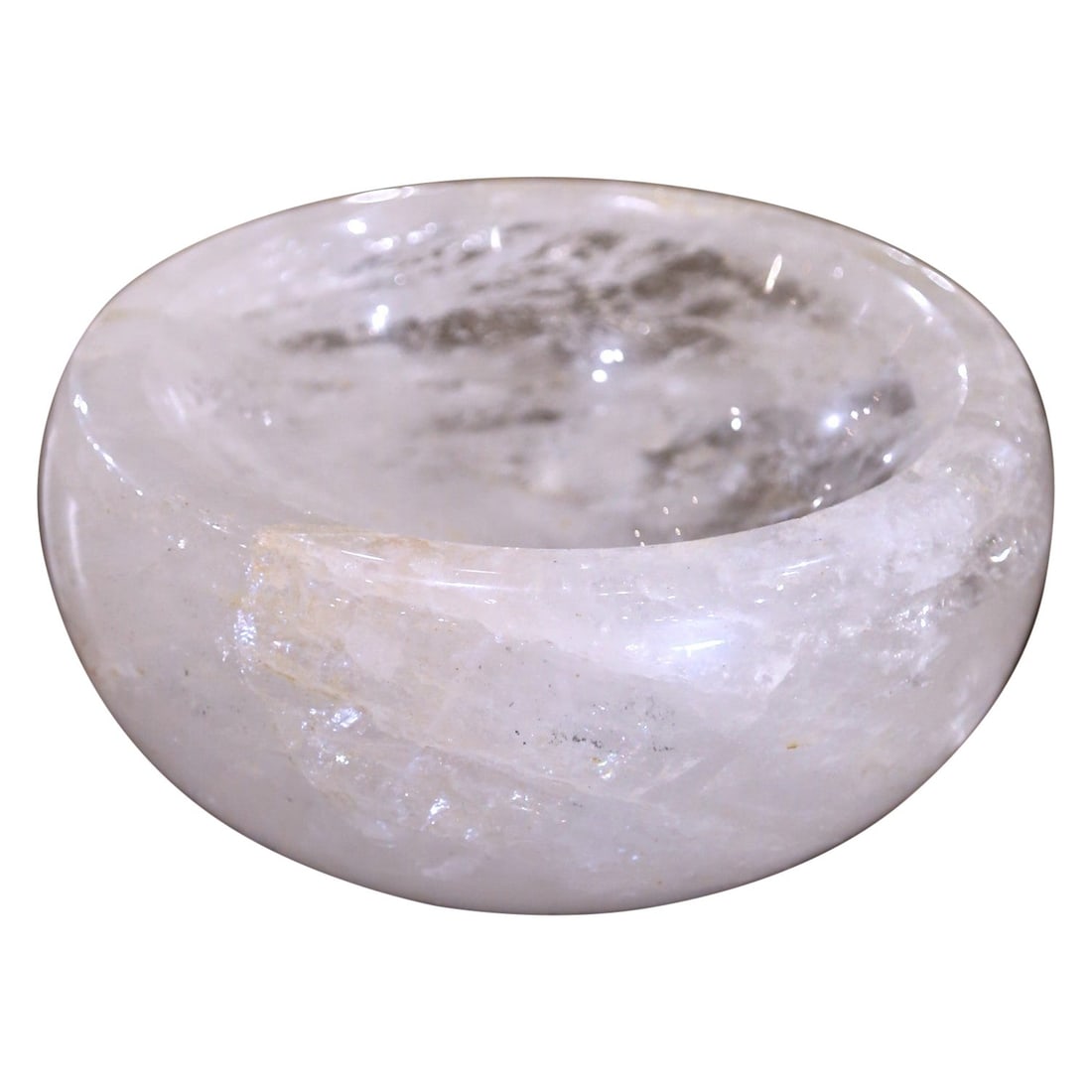 Hand Carved Rock Crystal Quartz Decorative Bowl from Brazil: Hand Carved Rock Crystal Quartz Decorative Bowl from Brazil This exquisite hand-carved decorative bowl, crafted from organic rock crystal quartz, is a stunning addition to any home decor. With a heigh
