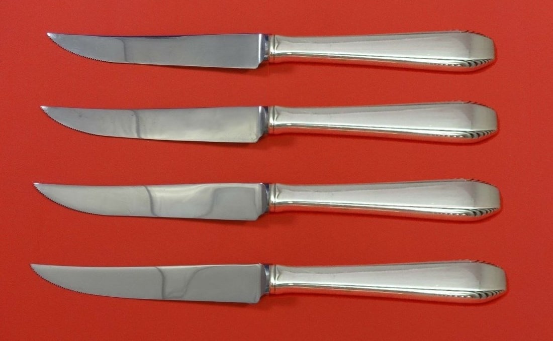 Towle Cascade Sterling Silver Steak Knife Set 4pc Custom Made 8.5": Towle Cascade Sterling Silver Steak Knife Set 4pc Custom Made 8.5" This exquisite 4-piece steak knife set features the Cascade pattern by Towle, crafted from high-quality sterling silver with hollow h