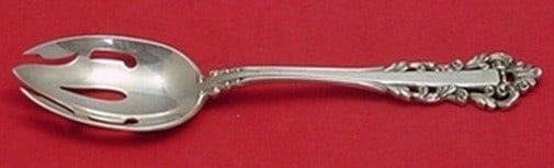 Sterling Silver Pierced Serving Spoon Medici New Pattern by Gorham 8.5 Inch: Sterling Silver Pierced Serving Spoon Medici New Pattern by Gorham 8.5 Inch This is a pierced serving spoon from the Medici New pattern by Gorham, crafted in sterling silver. The piece measures 8 1/2 