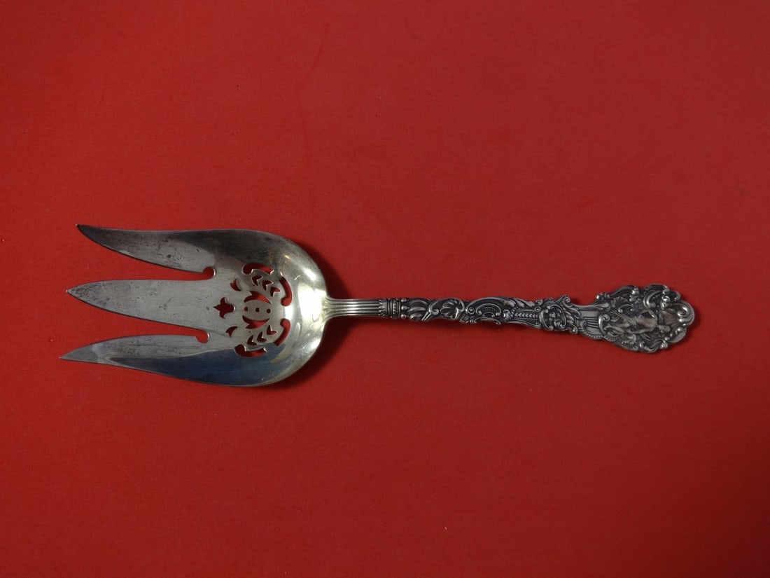 Gorham Versailles Sterling Silver Pierced Serving Fork 8 5/8": Gorham Versailles Sterling Silver Pierced Serving Fork 8 5/8" This exquisite vegetable serving fork is crafted in sterling silver and features the elegant Versailles pattern by Gorham. Measuring 8 5/8