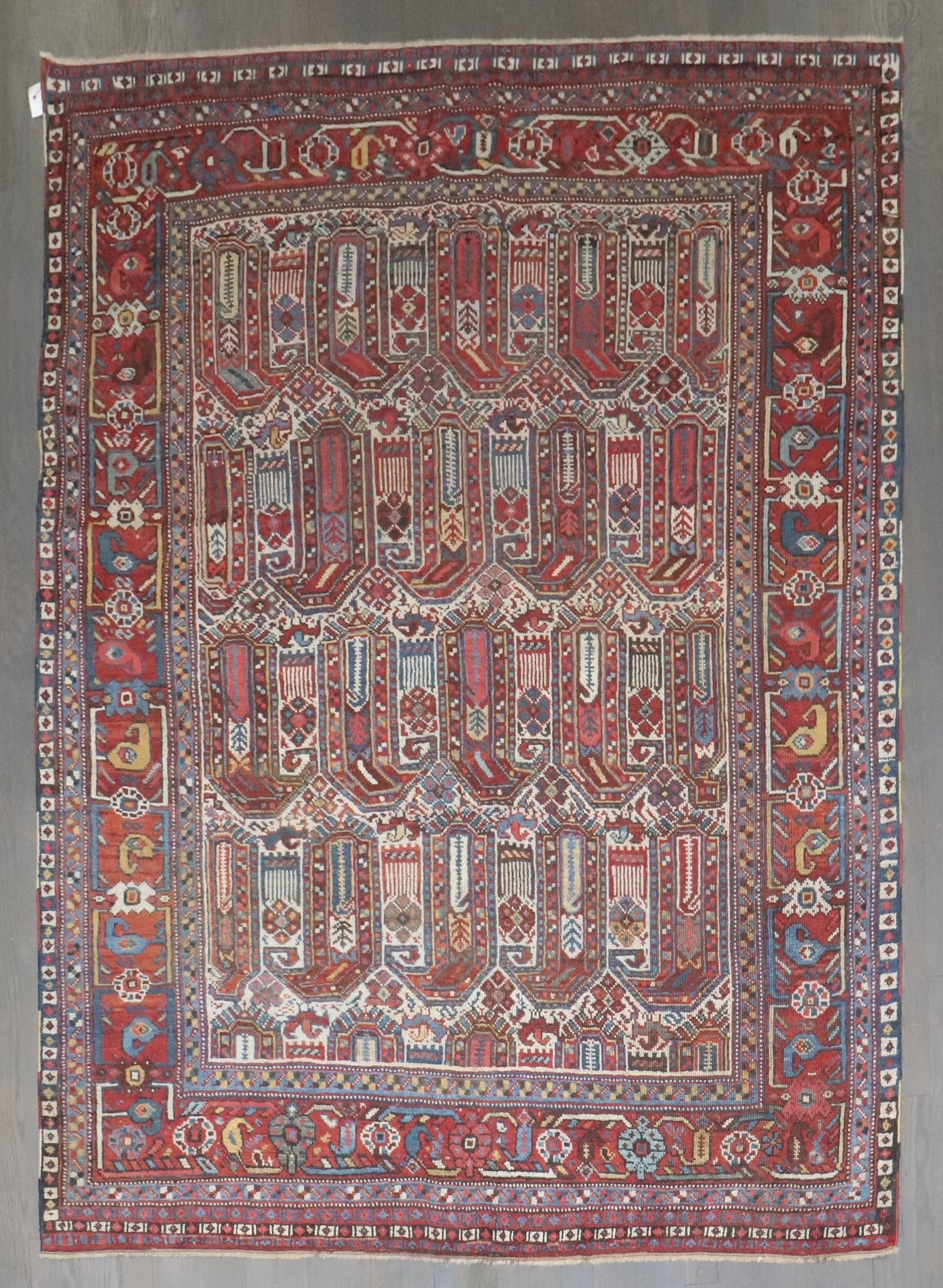 5' 3" x 6' 10" Persian Afshar Shiraz Boteh Accent Rug: 5' 3" x 6' 10" Persian Afshar Shiraz Boteh Accent Rug Early 20th century Persian Shiraz rug featuring a boteh, or large paisley, design. This pre-owned tribal rug is identified as Afshar/Shiraz and wo