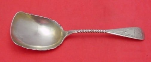 Bailey & Co 9 Inch Coin Silver Cracker Scoop Engine Turned Design: Bailey & Co 9 Inch Coin Silver Cracker Scoop Engine Turned Design Discover this exquisite 9-inch cracker scoop crafted by Bailey & Co. from coin silver, dating back to 1850-1899. This serving piece fe