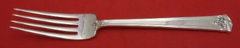 Tuttle Trianon Sterling Silver Dinner Fork 7 7/8 Inches: Tuttle Trianon Sterling Silver Dinner Fork 7 7/8 Inches Experience timeless elegance with the Trianon dinner fork by Tuttle, crafted from high-quality sterling silver. This exquisite piece, measuring 