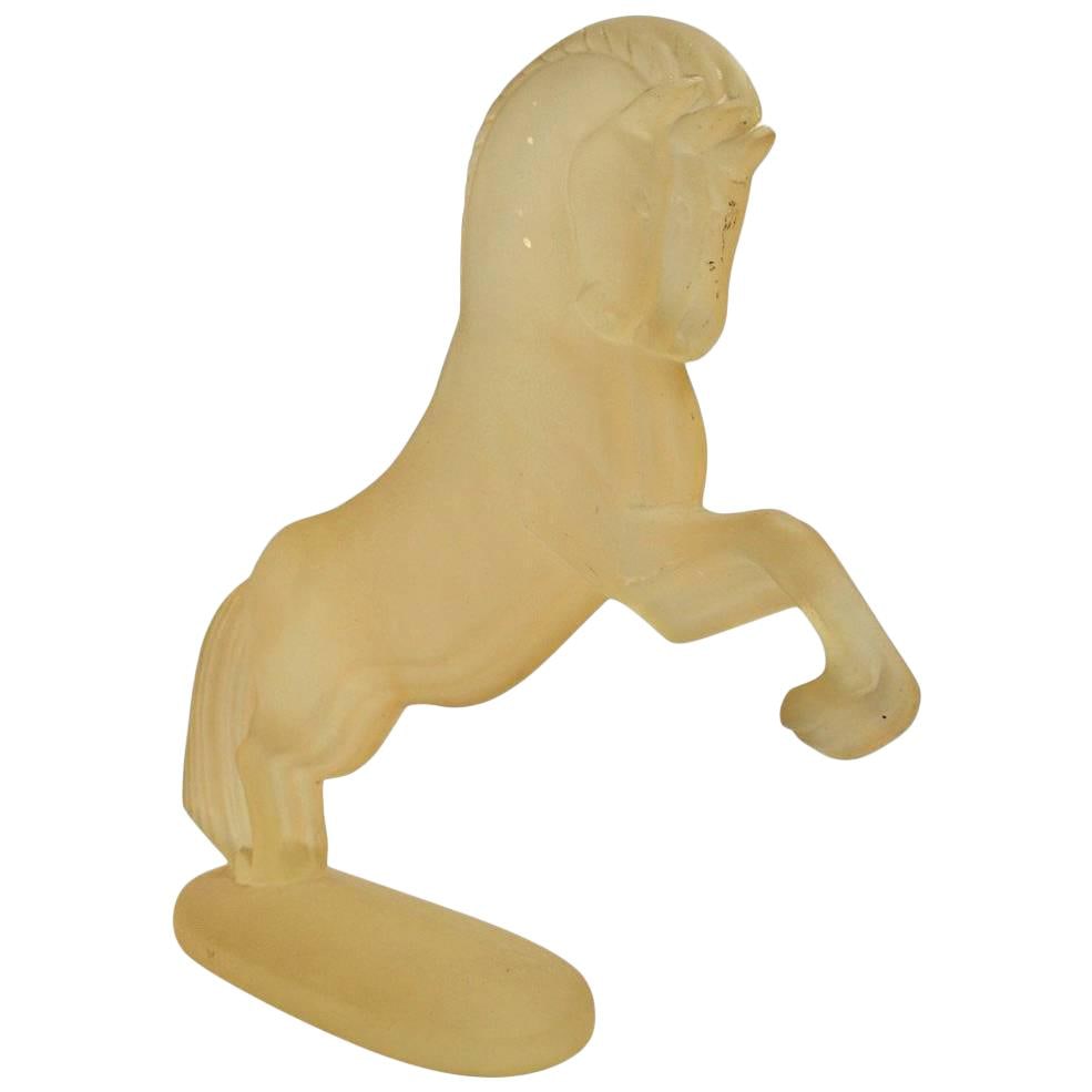 Vintage Cast Resin Horse Figurine Light Yellow 1970s-1980s: Vintage Cast Resin Horse Figurine Light Yellow 1970s-1980s This decorative cast resin horse, crafted in the 1970s-1980s, features a charming light yellow finish that adds a unique touch to any home de