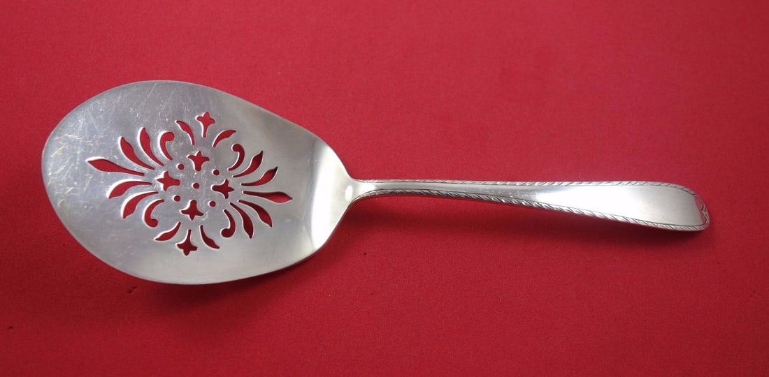 Gorham Feather Edge Sterling Silver Pierced Tomato Server 8 in: Gorham Feather Edge Sterling Silver Pierced Tomato Server 8 in Gorham Feather Edge sterling silver pierced tomato server in the Feather Edge, also known as Dolly Madison, pattern. This serving piece i
