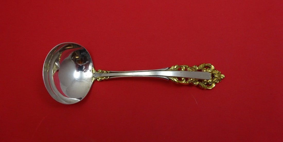 Gorham Medici New Sterling Silver Gravy Ladle 6 7/8": Gorham Medici New Sterling Silver Gravy Ladle 6 7/8" This exquisite gravy ladle is crafted in the Medici New pattern by Gorham, showcasing timeless elegance. Made from high-quality sterling silver, it