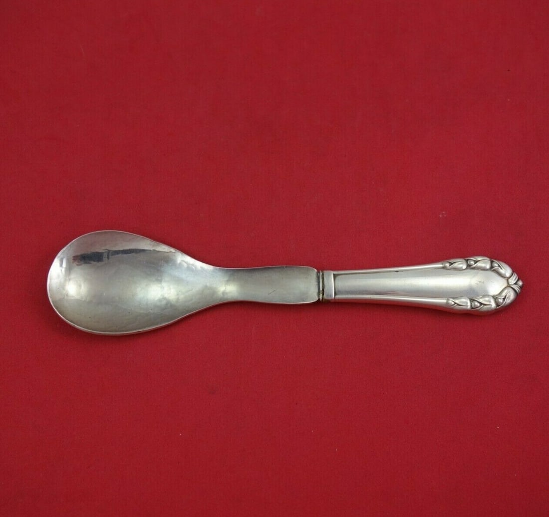Georg Jensen Lily of the Valley Sterling Preserve Serving Spoon Hammered Bowl: Georg Jensen Lily of the Valley Sterling Preserve Serving Spoon Hammered Bowl A Georg Jensen Lily of the Valley preserve spoon in sterling silver with a hollow handle and hand-hammered bowl. It is not