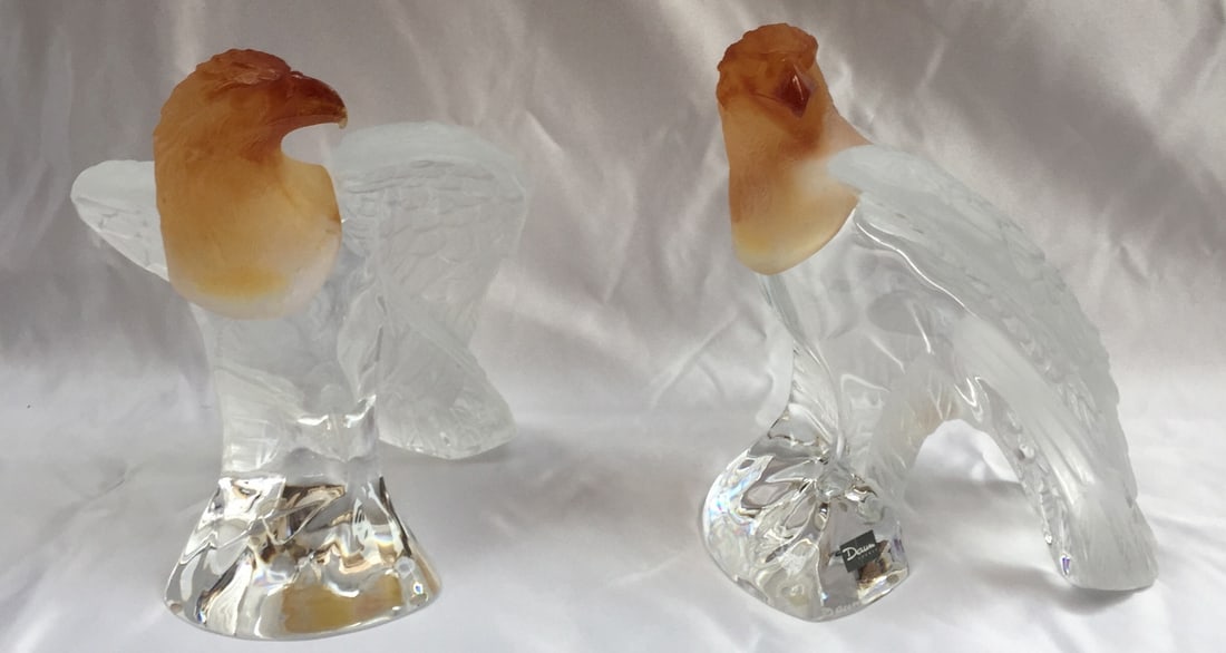 Daum Nancy Colored Crystal Eagles Signed Art Glass Pair: Daum Nancy Colored Crystal Eagles Signed Art Glass Pair Presenting a stunning pair of Daum Nancy colored crystal eagles that showcase exquisite craftsmanship. Each eagle is made from high-quality glas