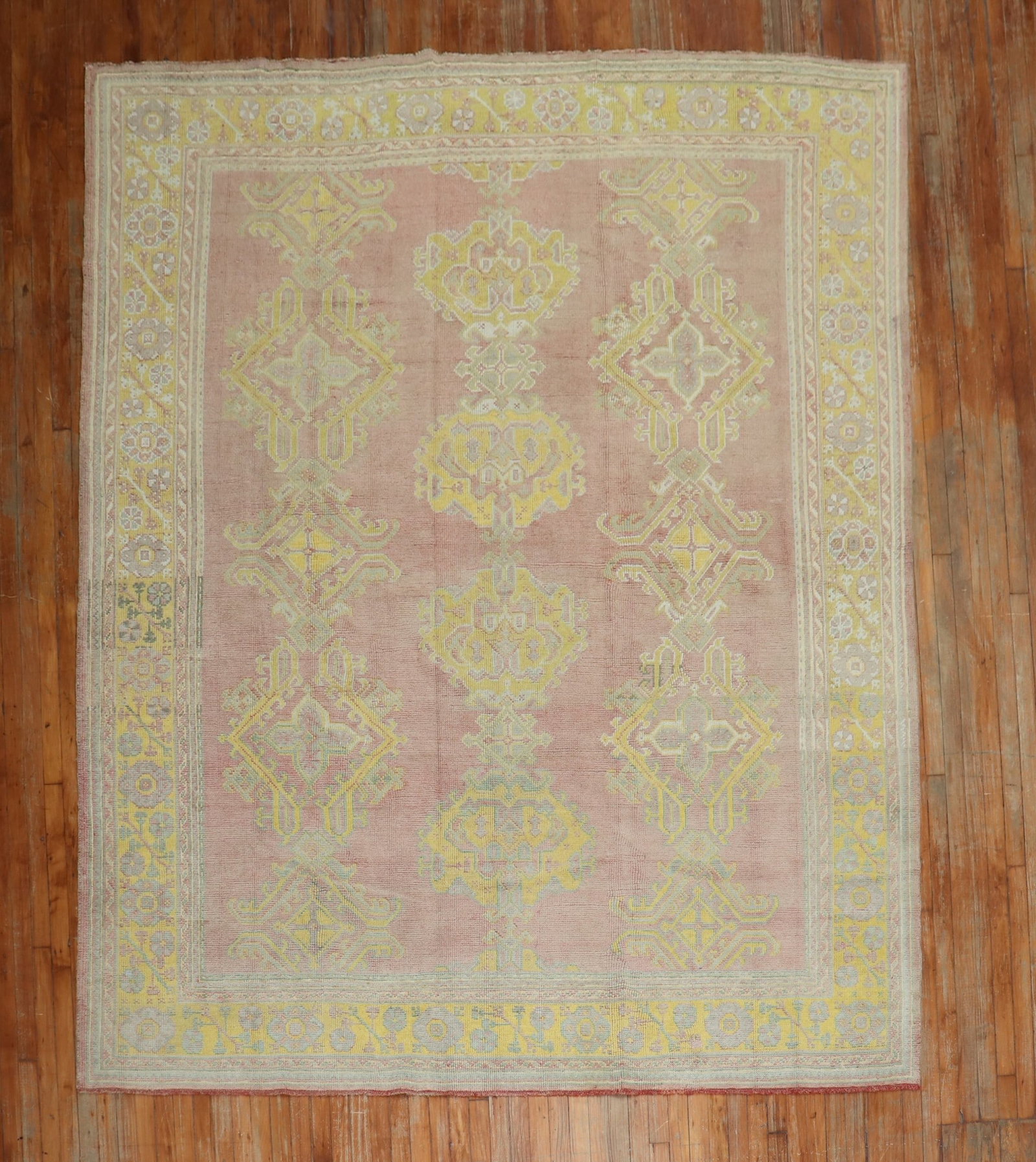 8' 2" x 10' 4" Turkish Oushak Rug Rose Field Yellow Border: 8' 2" x 10' 4" Turkish Oushak Rug Rose Field Yellow Border Early 20th century Turkish Oushak rug featuring an all-over geometric design on a rose field with a bright yellow border. Bright yellow, ligh