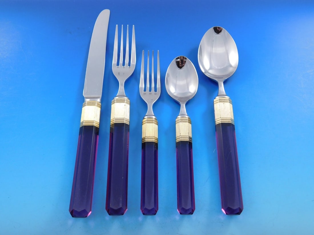 Mikasa Prisma Amethyst Flatware Set 20 Pieces by Larry Laslo: Mikasa Prisma Amethyst Flatware Set 20 Pieces by Larry Laslo Introducing the elegant Prisma Amethyst Flatware Set by Mikasa, designed by Larry Laslo. This exquisite 20-piece set features stainless ste