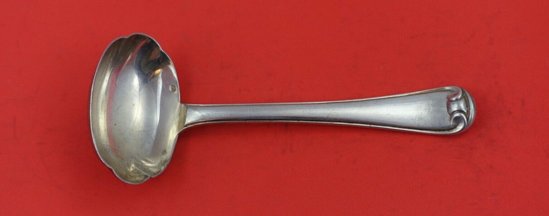Puiforcat Mazarin Sterling Silver Gravy Ladle 7 1/4 Inch: Puiforcat Mazarin Sterling Silver Gravy Ladle 7 1/4 Inch This exquisite gravy ladle is crafted by Puiforcat in the elegant Mazarin pattern. Made from high-quality sterling silver, it measures a substa