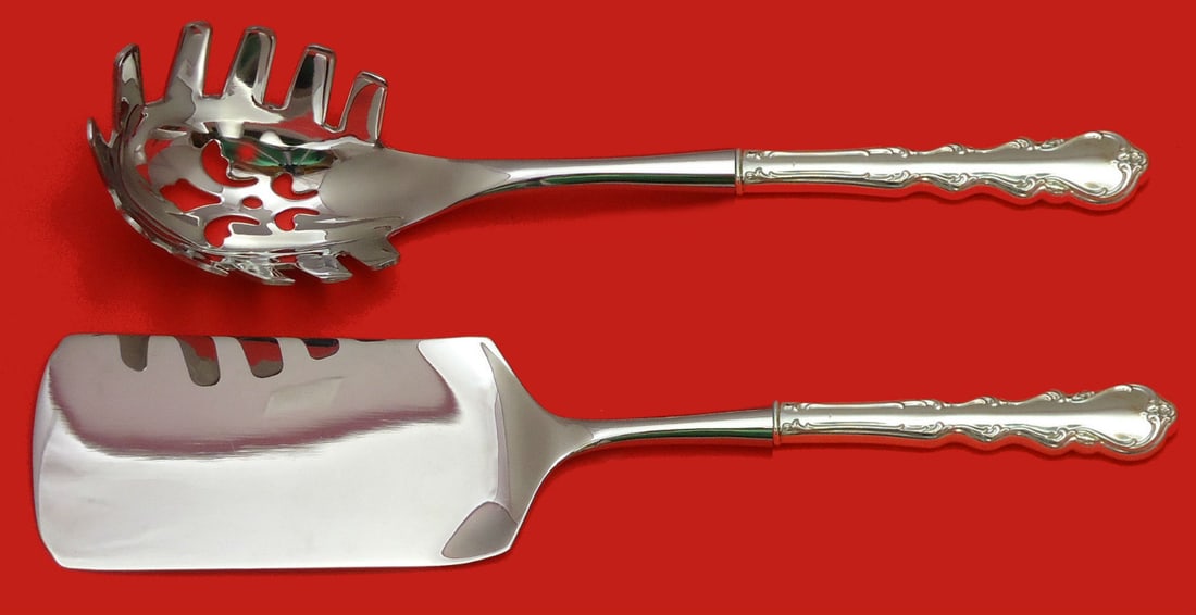 Angelique International Sterling Silver 2pc Pasta Serving Set: Angelique International Sterling Silver 2pc Pasta Serving Set Indulge in the elegance of the Angelique Hostess Set by International Sterling, a stunning 2-piece Italian pasta serving set that beautifu