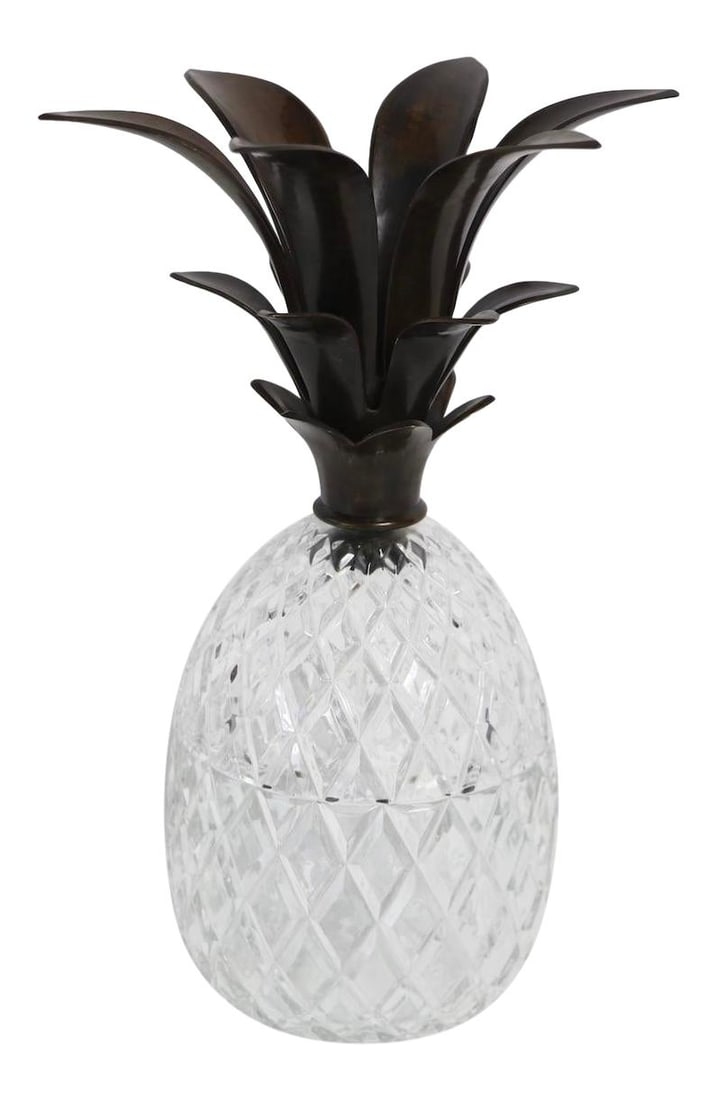 Elegant Bronze and Crystal Pineapple Lidded Jar 14": Elegant Bronze and Crystal Pineapple Lidded Jar 14" Presenting a stunning lidded jar crafted from crystal and bronze, elegantly designed in the shape of a pineapple. The pressed glass body features a 