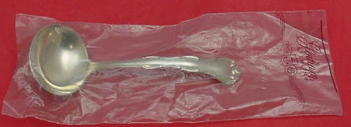 Gorham Rondo Sterling Silver Gravy Ladle 6 3/8 Inch: Gorham Rondo Sterling Silver Gravy Ladle 6 3/8 Inch Elevate your dining experience with this exquisite Rondo gravy ladle by Gorham. Crafted from high-quality sterling silver, this ladle features a cla