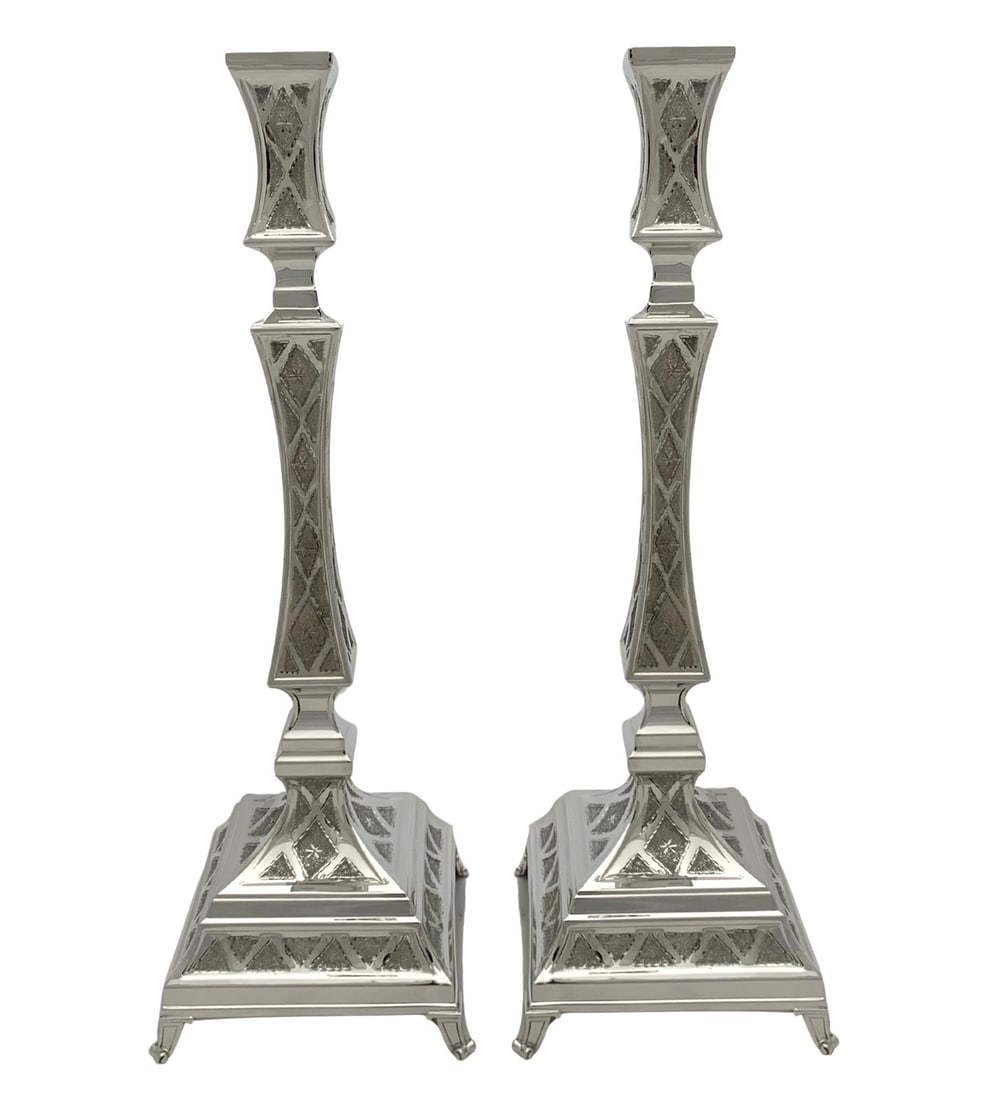 Handmade Modern 925 Sterling Silver Diamond Cut Candlesticks 15.5": Handmade Modern 925 Sterling Silver Diamond Cut Candlesticks 15.5" Elevate your home decor with these exquisite handmade modern candlesticks, crafted from fine 925 sterling silver. Their diamond cut a