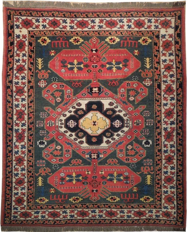 6 x 7 Hand-Knotted Kazak Rug Wool on Wool Tribal Medallion: 6 x 7 Hand-Knotted Kazak Rug Wool on Wool Tribal Medallion Free continental US Shipping This 6 x 7 hand-knotted Kazak rug features a traditional geometric tribal design with repeating medallion patter