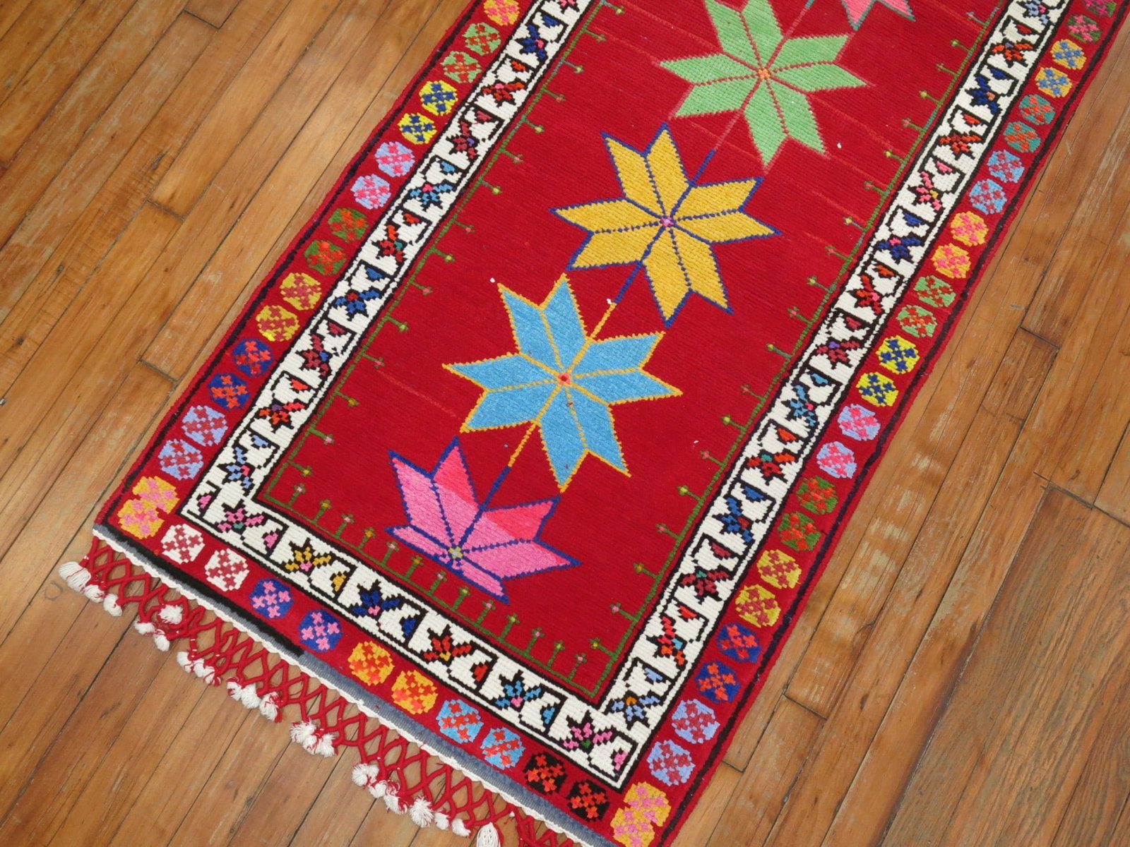 2' 7" x 14' 3" Mid 20th Century Turkish Runner Rug: 2' 7" x 14' 3" Mid 20th Century Turkish Runner Rug Mid 20th century Turkish runner rug with a bright vintage design. This pre-owned piece is categorized as a runner and offers a long, narrow format su