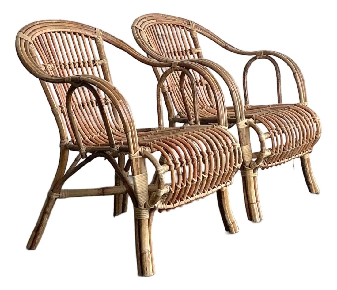 Pair of Handcrafted 1970s Rattan Boho Lounge Chairs with Vertical Slat Design: Pair of Handcrafted 1970s Rattan Boho Lounge Chairs with Vertical Slat Design This pair of vintage lounge chairs showcases a 1970s Boho Chic and Mid-Century Modern design, expertly handcrafted from ha