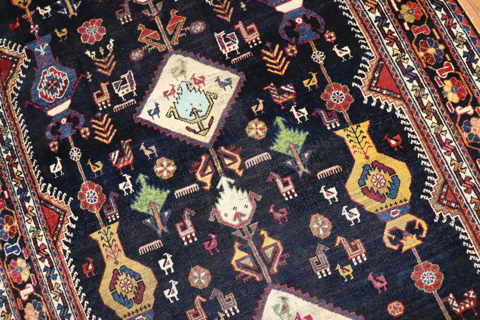 4' 11" x 11' 8" Persian Shiraz tribal gallery rug: 4' 11" x 11' 8" Persian Shiraz tribal gallery rug An early 20th century Persian Shiraz tribal gallery rug with pictorial design. This pre-owned piece is identified as a gallery-size rug. Specification
