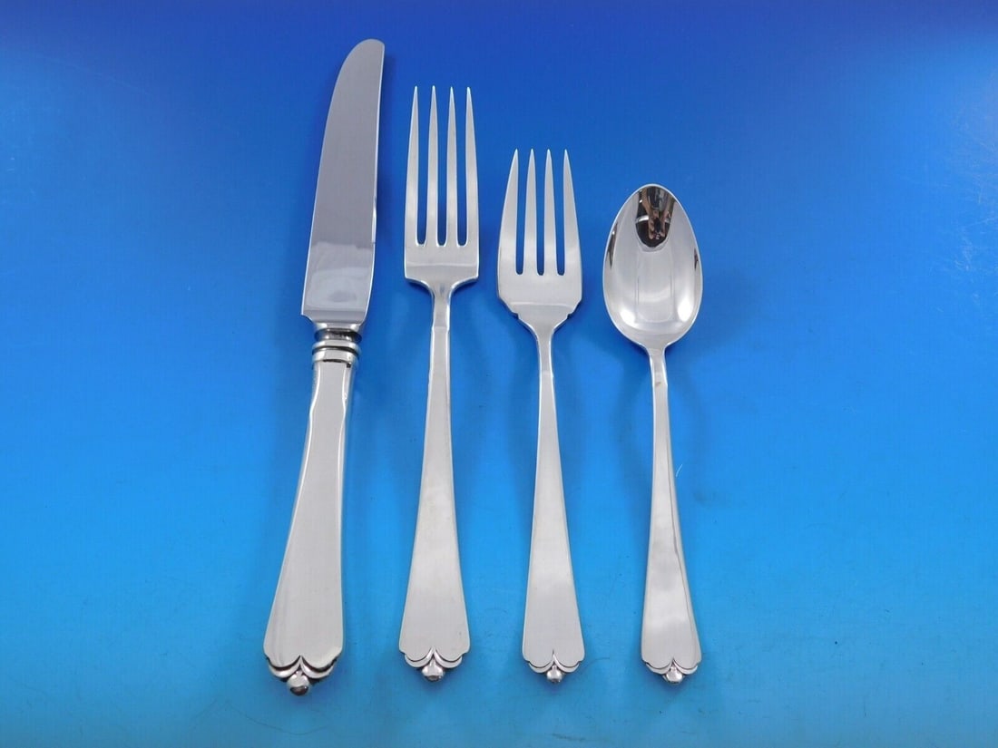 Watson-Wallace Lotus Sterling Silver 4-Piece Place Setting: Watson-Wallace Lotus Sterling Silver 4-Piece Place Setting This exquisite 4-piece place setting in the Lotus pattern by Watson-Wallace is crafted from high-quality sterling silver (.925). The set, dat