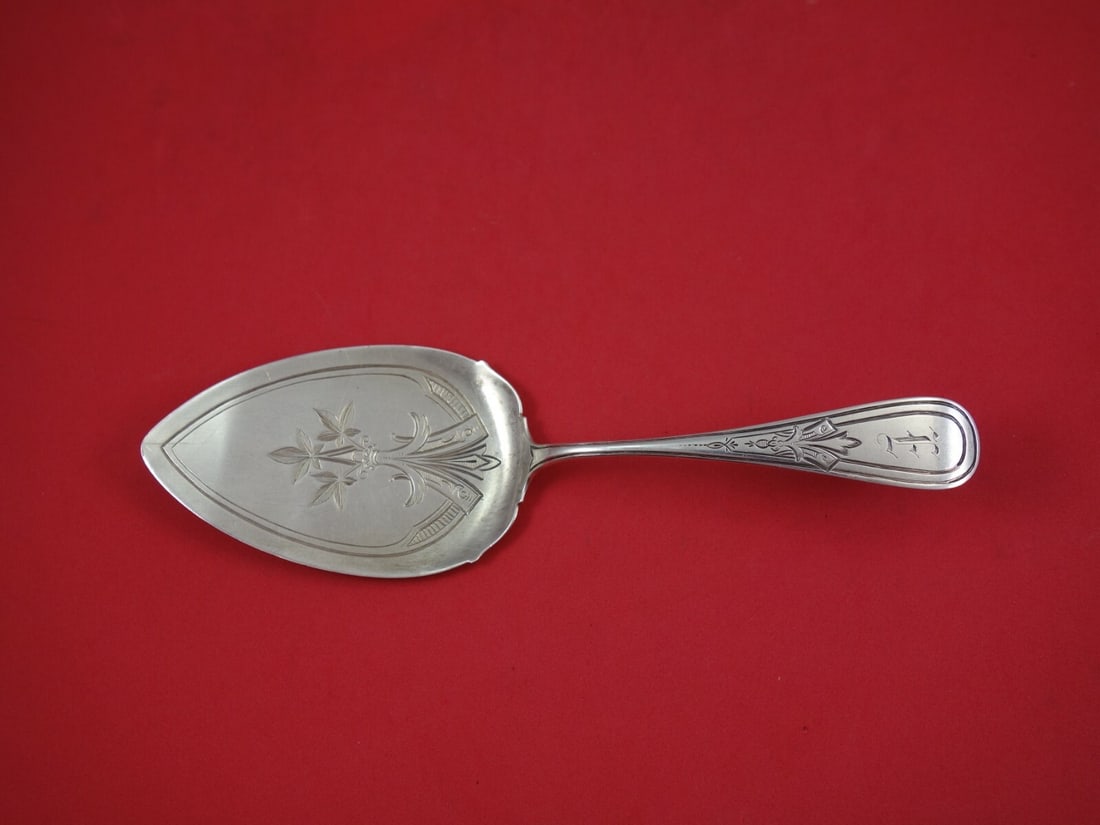 Whiting Sterling Silver Brite-Cut Vintage Pie Server 8.5": Whiting Sterling Silver Brite-Cut Vintage Pie Server 8.5" This exquisite vintage pie server, crafted by Whiting Manufacturing Company, showcases a beautiful brite-cut design in all-sterling silver. Me