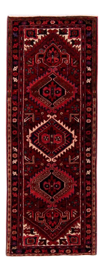 Antique Heriz Handmade Wool Runner Red Medallion 2'5 x 6'6: Antique Heriz Handmade Wool Runner Red Medallion 2'5 x 6'6 This stunning Antique Heriz handmade wool runner features a vibrant red field adorned with a multicolor geometric medallion design, showcasin