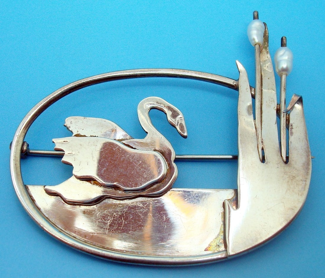 Arts and Crafts Handwrought Sterling Silver Brooch with Swan and Freshwater Pearls: Arts and Crafts Handwrought Sterling Silver Brooch with Swan and Freshwater Pearls This vintage handwrought sterling silver brooch features a swan on water with cattails, accented by natural freshwate