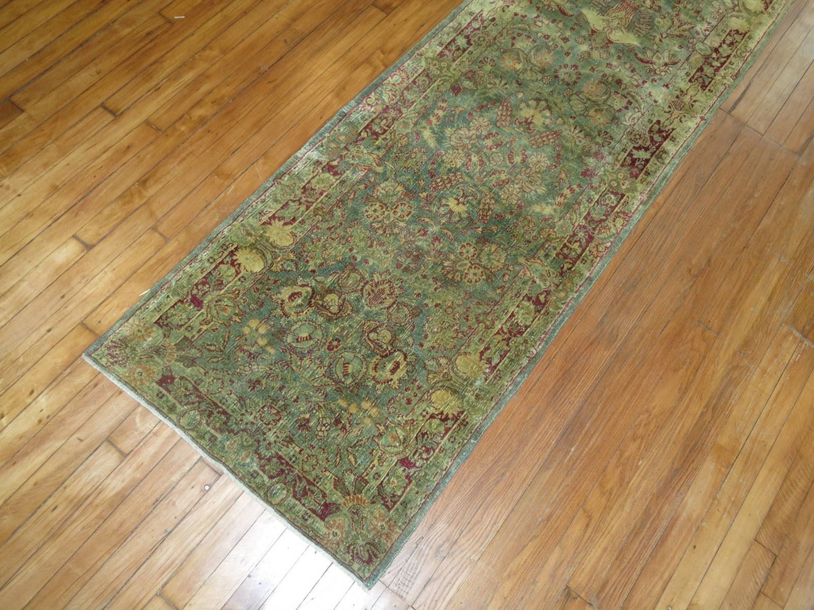 2' 8" x 19' 3" Persian Kashan rug runner green raspberry: 2' 8" x 19' 3" Persian Kashan rug runner green raspberry Vintage Persian Kashan runner from the 2nd quarter of the 20th century, featuring a narrow elongated form and an intricate floral pattern in gr
