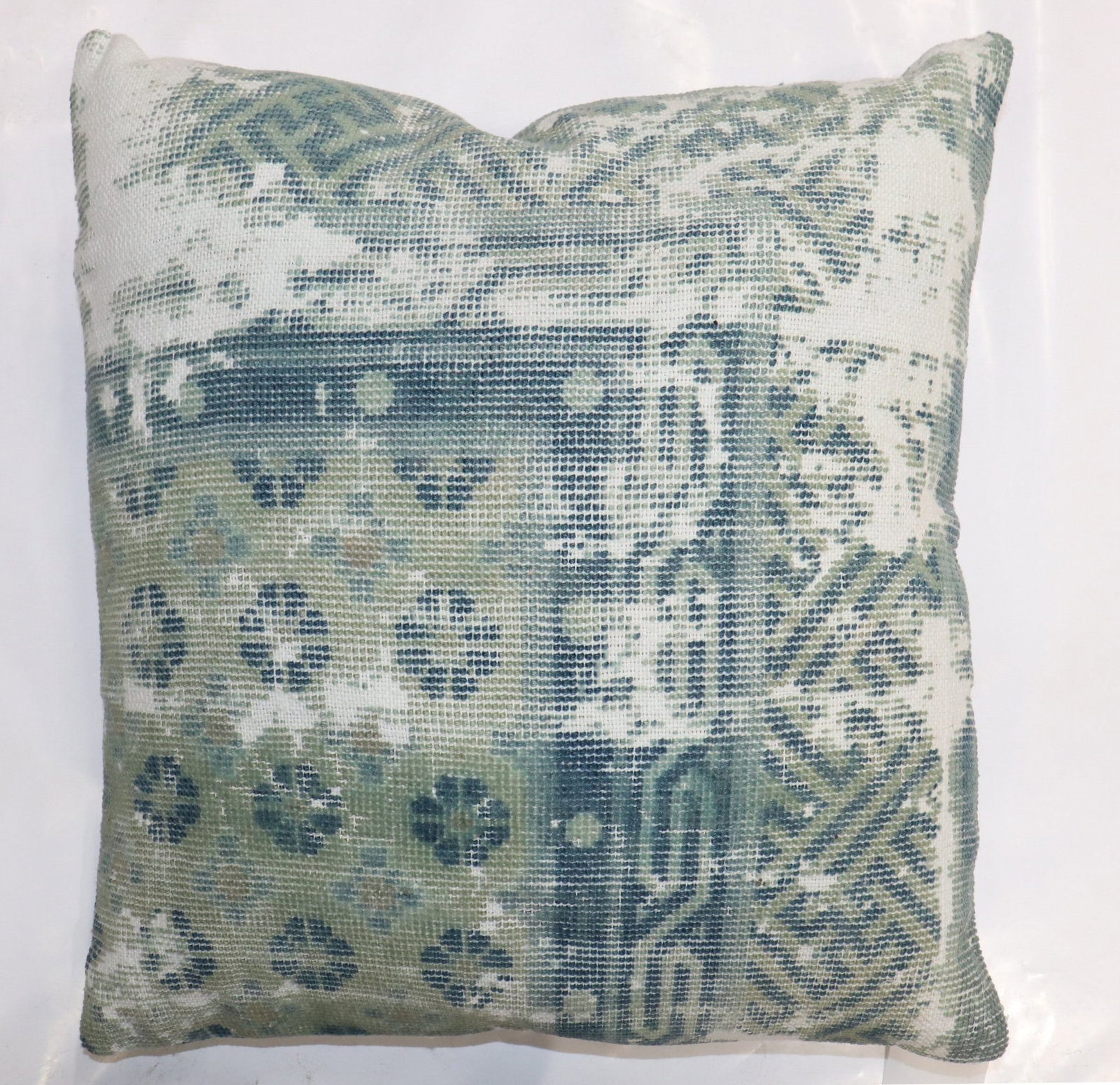 Chinese rug pillow shabby chic 1' 8" x 1' 8": Chinese rug pillow shabby chic 1' 8" x 1' 8" Decorative pillow made from a worn Chinese rug in a shabby chic style. This pre-owned piece offers antique textile character in a compact square pillow for