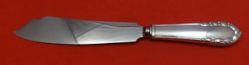 Georg Jensen Lily of the Valley Cake Knife 10 1/4 Sterling Silver: Georg Jensen Lily of the Valley Cake Knife 10 1/4 Sterling Silver This exquisite cake knife features the elegant Lily of the Valley pattern by Georg Jensen. Crafted from high-quality sterling silver, 