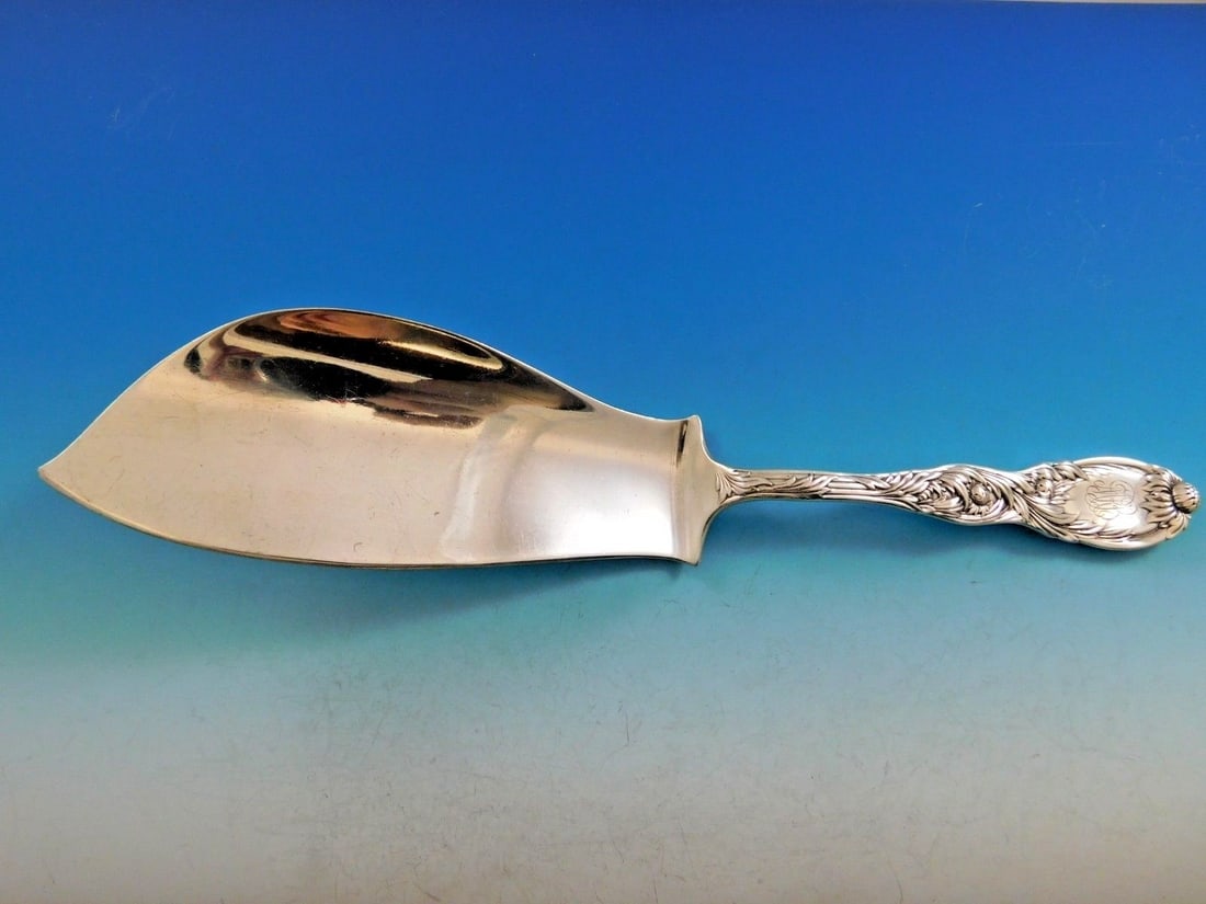 Sterling Silver Fish Server in Chrysanthemum Pattern by Tiffany 12 1/4 Inch: Sterling Silver Fish Server in Chrysanthemum Pattern by Tiffany 12 1/4 Inch This sterling silver fish server is part of the Chrysanthemum pattern by Tiffany & Co., designed in 1880 by Charles Grosjean