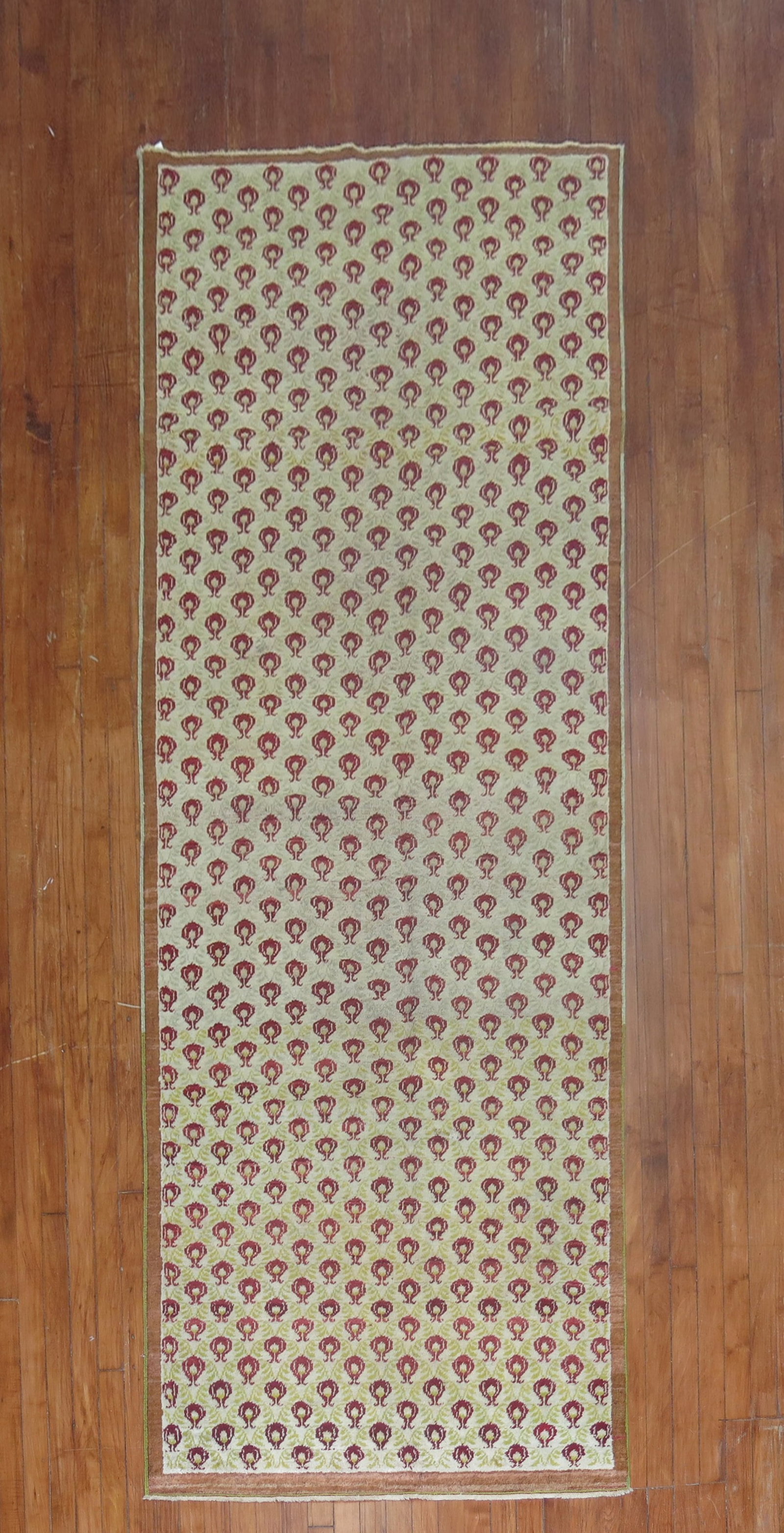 3' 6" x 10' 5" Turkish Konya rug runner: 3' 6" x 10' 5" Turkish Konya rug runner Mid 20th century Turkish Konya runner with a repetitive floral motif design. This pre-owned rug is identified as a Konya runner. Specifications Origin: Turkey T