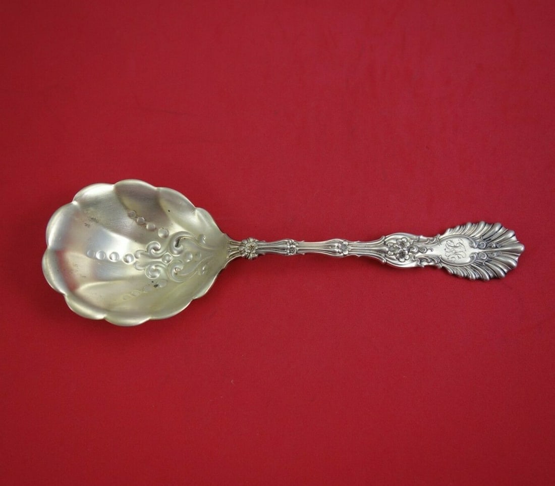 Whiting Radiant sterling berry serving spoon gold washed 8 1/2": Whiting Radiant sterling berry serving spoon gold washed 8 1/2" Sterling silver berry serving spoon in the Radiant pattern by Whiting, featuring a gold-washed finish and an 8 1/2 inch length. The spoo