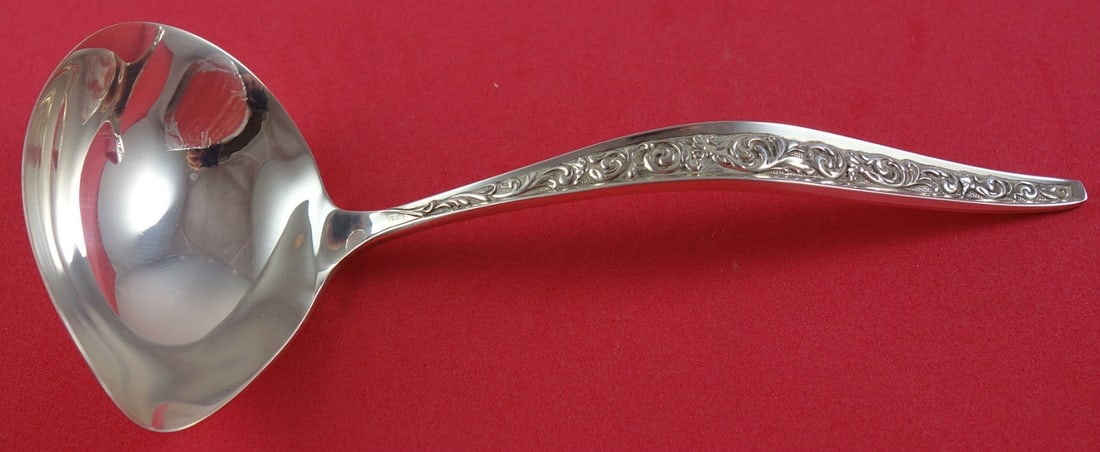 Reed and Barton Renaissance Scroll Sterling Silver Gravy Ladle 7": Reed and Barton Renaissance Scroll Sterling Silver Gravy Ladle 7" Sterling silver gravy ladle in the Renaissance Scroll pattern by Reed & Barton. This post-1940 piece is not monogrammed and is in exce