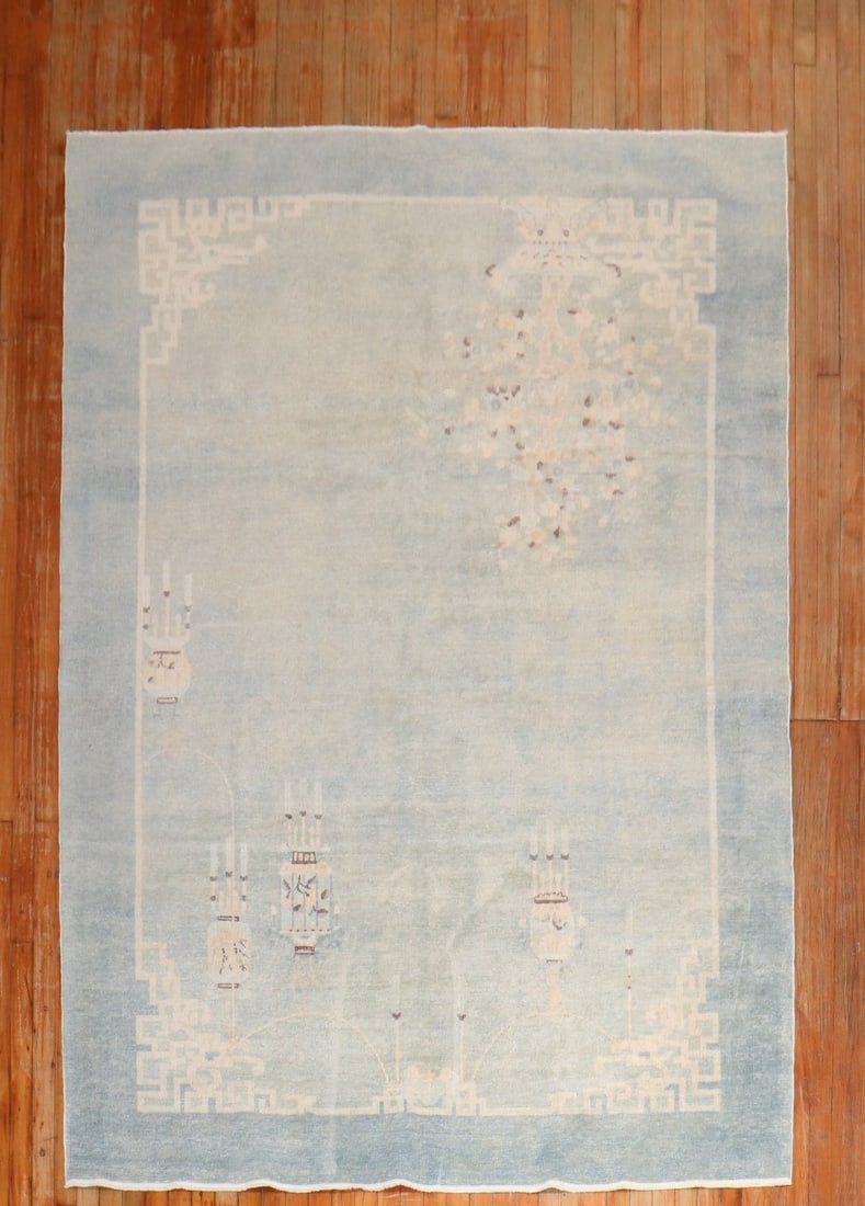 6' 1" x 9' Early 20th Century Chinese Rug Pale Blue: 6' 1" x 9' Early 20th Century Chinese Rug Pale Blue Early 20th century Chinese rug in a very pale blue tone. The design features subtle decorative motifs with corner detailing and a central design. Pr