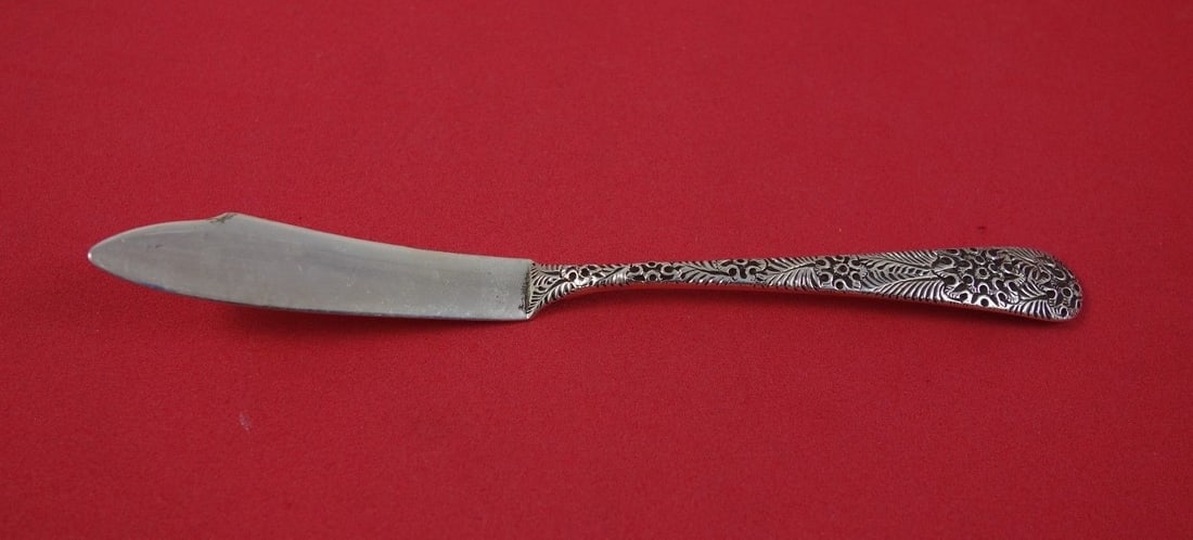 Tiffany & Co Antique Engraved Sterling Silver Pate Knife 5 1/4": Tiffany & Co Antique Engraved Sterling Silver Pate Knife 5 1/4" This exquisite antique pate knife, crafted by Tiffany & Co., features a stunning engraved pattern. Made from high-quality sterling silve