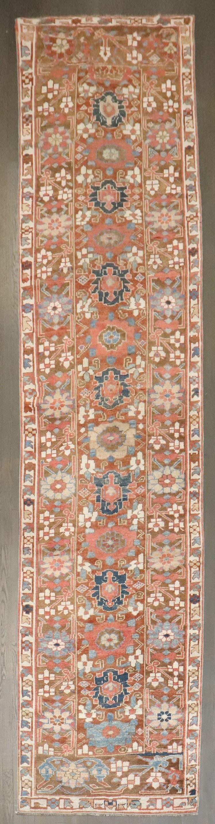 3' 4" x 13' 8" Persian Veramin Rug Runner: 3' 4" x 13' 8" Persian Veramin Rug Runner Early 20th century Persian Veramin runner with a highly decorative design. This pre-owned runner is identified as a Persian Veramin example. Specifications Ty