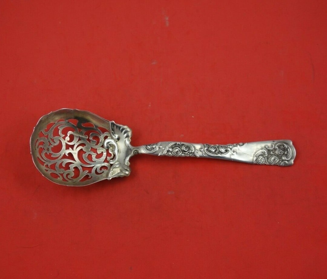 Whiting Sterling Silver Rose and Scroll Serving Spoon 8.5": Whiting Sterling Silver Rose and Scroll Serving Spoon 8.5" This exquisite serving spoon from Whiting showcases the elegant Rose and Scroll pattern, also known as La Francais. Crafted from high-quality