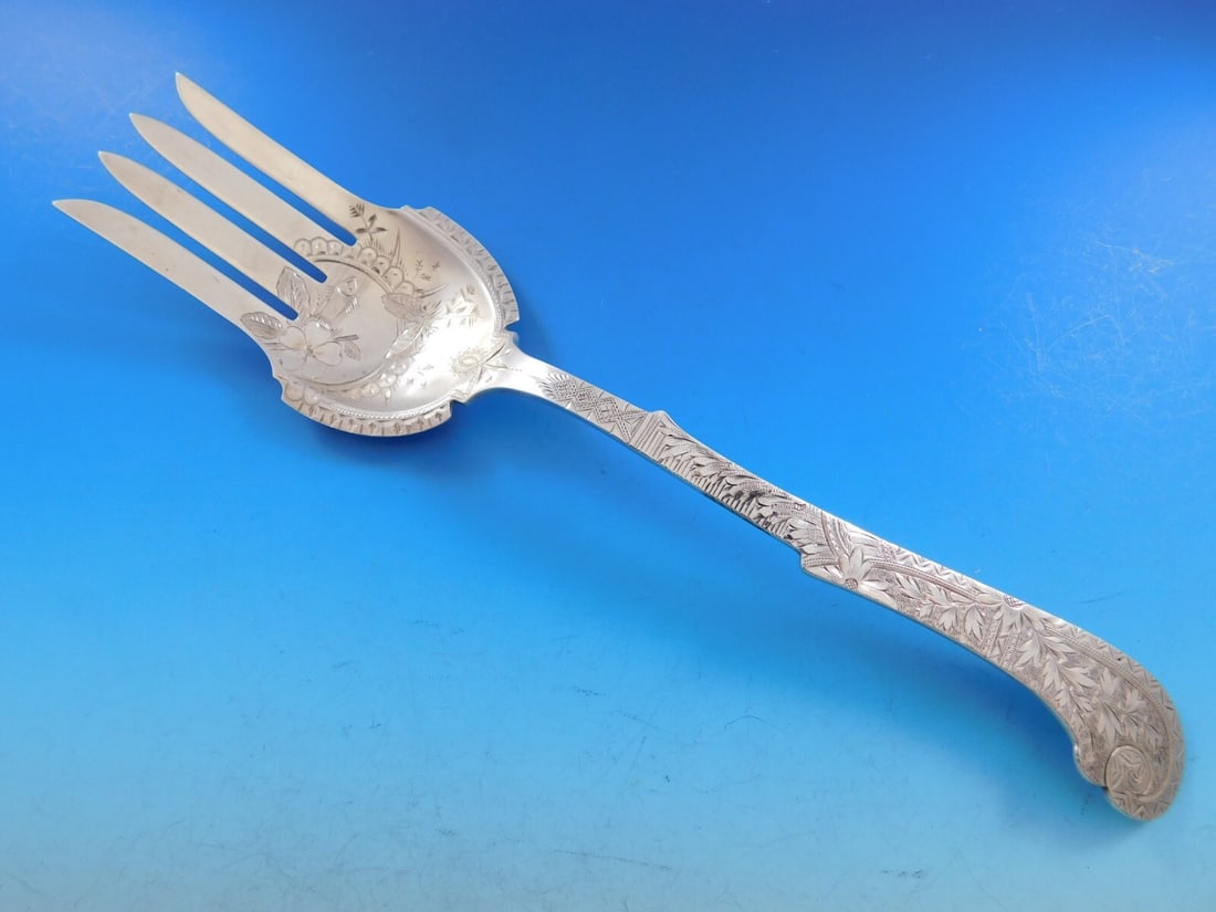 W Moir Brite-Cut Sterling Silver Salad Serving Fork Fish Design 10 1/2": W Moir Brite-Cut Sterling Silver Salad Serving Fork Fish Design 10 1/2" This exquisite Brite-Cut salad serving fork is crafted from high-quality sterling silver and displays a charming fish design by 